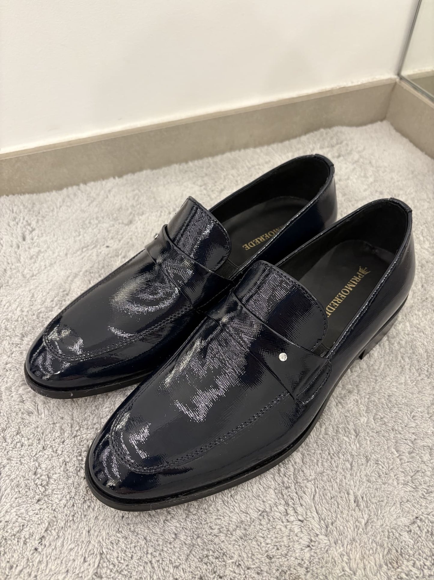 Mocassino in vernice con punto luce