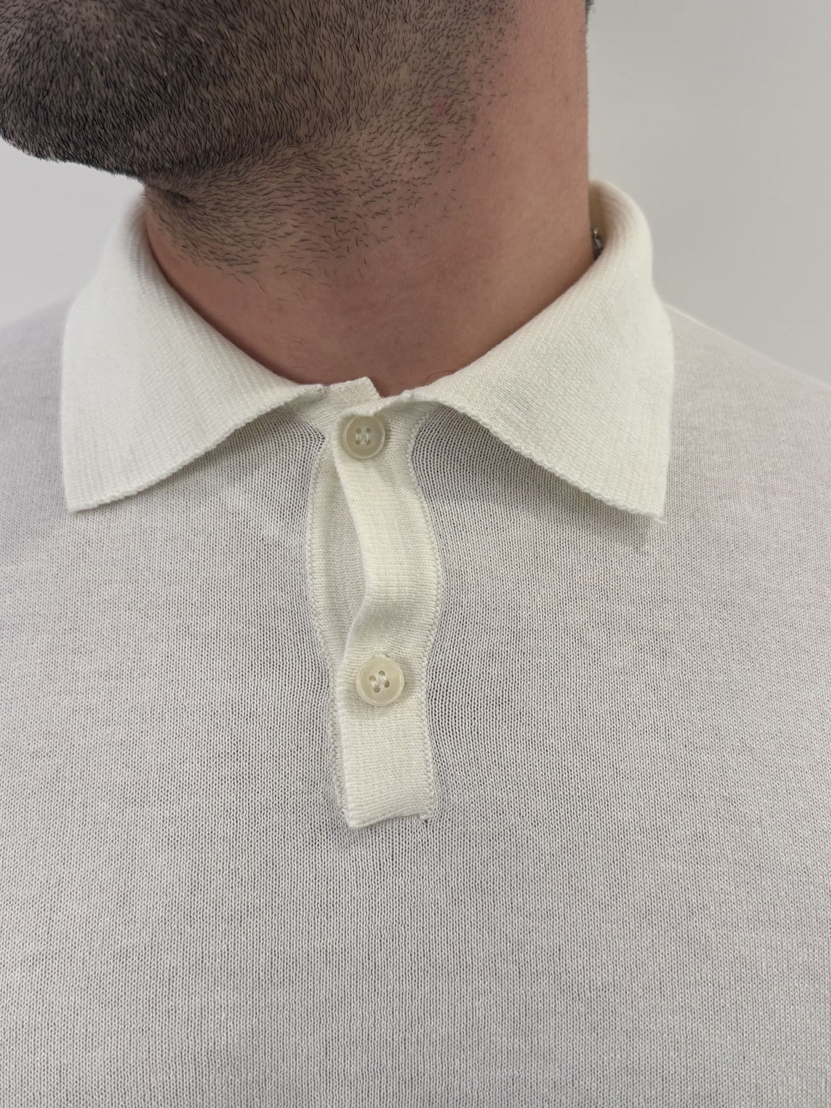 Polo in filo in cotone bianco