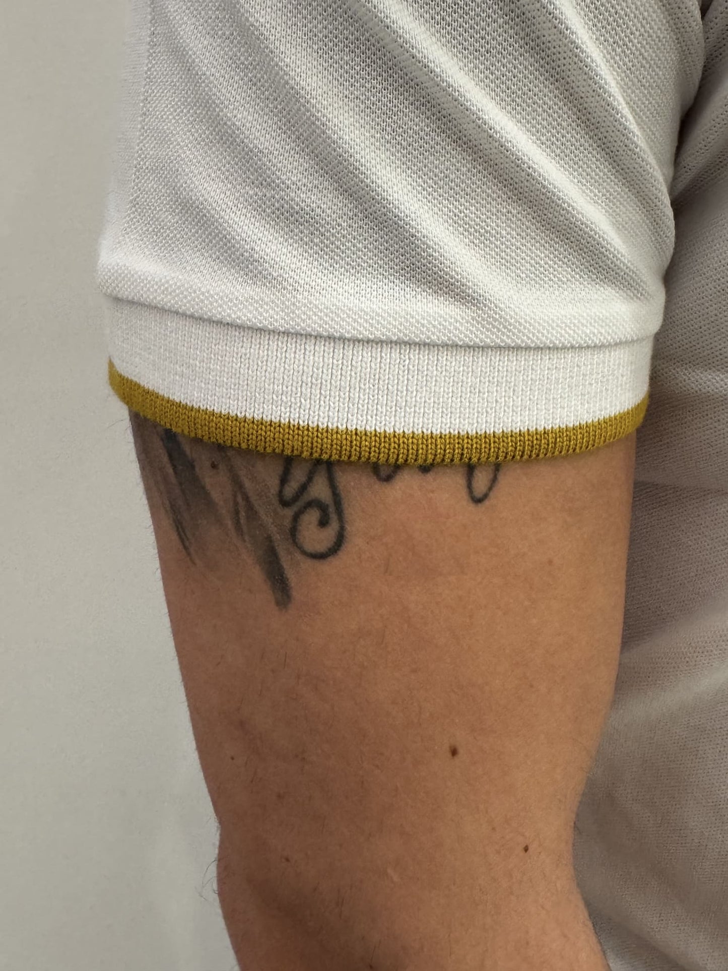 Polo in cotone con bordino