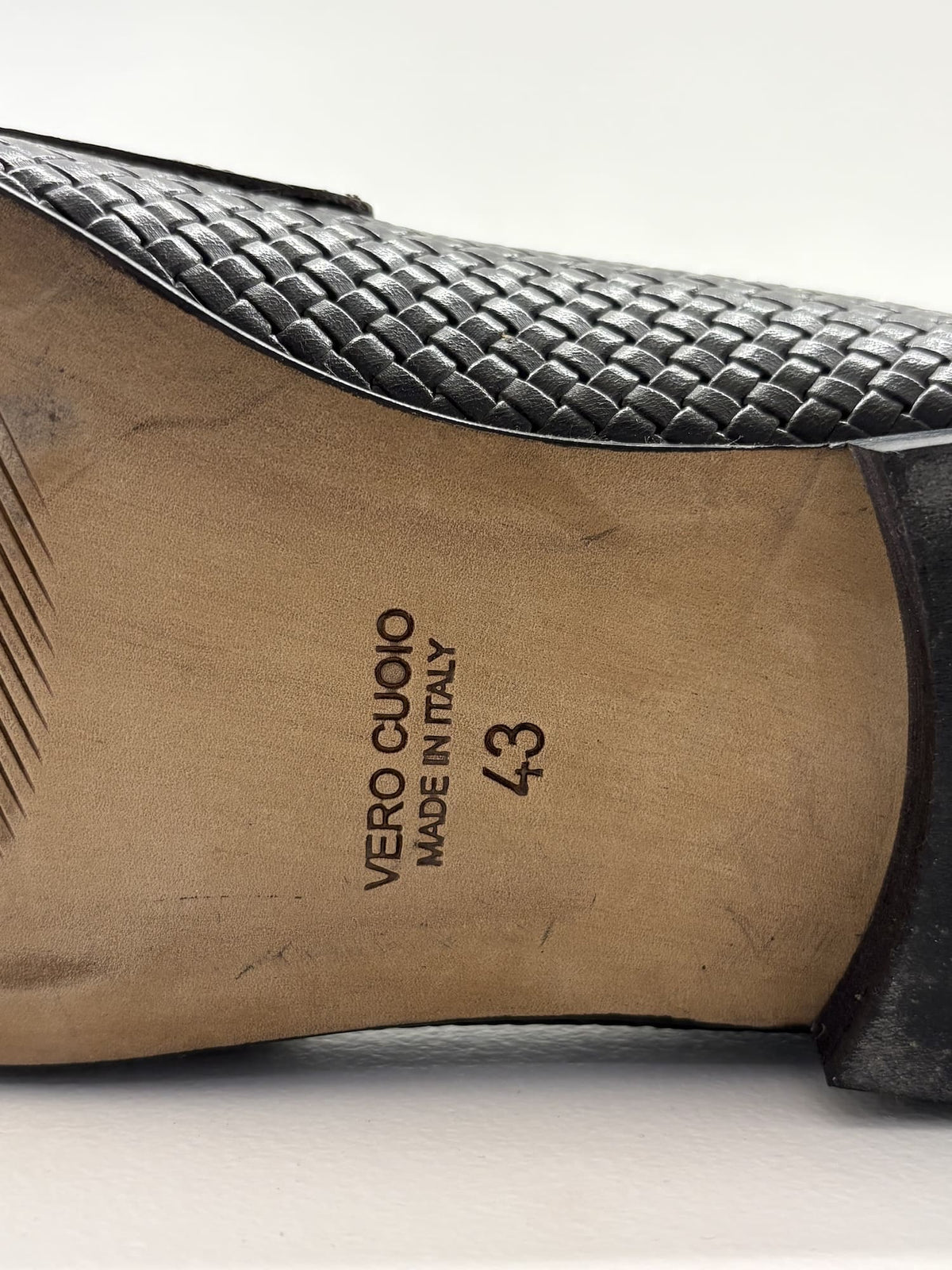 Mocassino in pelle intrecciata doppia fibbia testa moro