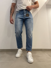 Jeans scuro graffiato