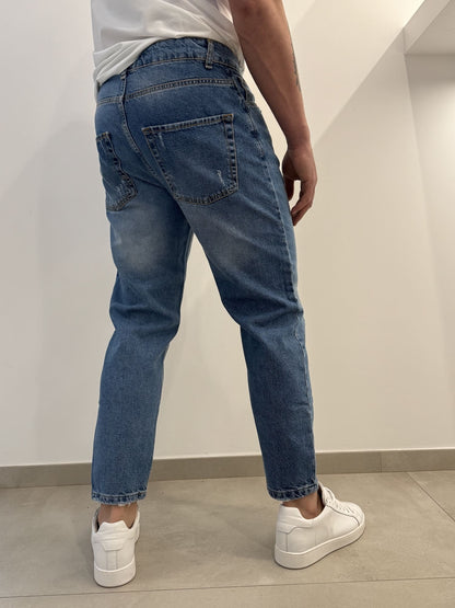 Jeans scuro graffiato