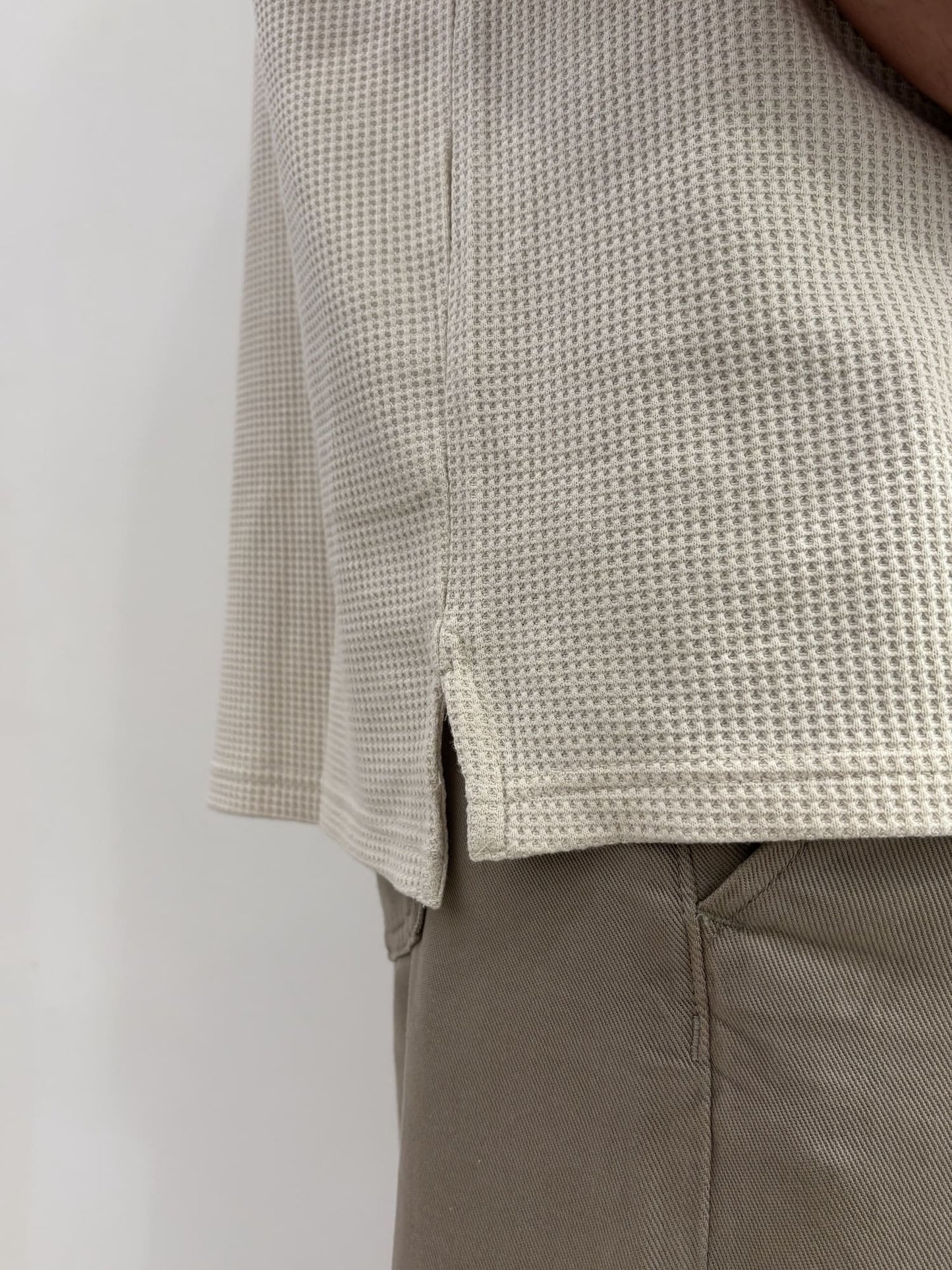 Polo Tommy Jeans con mezza zip