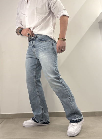 Jeans chiaro baggy con fondo graffiato