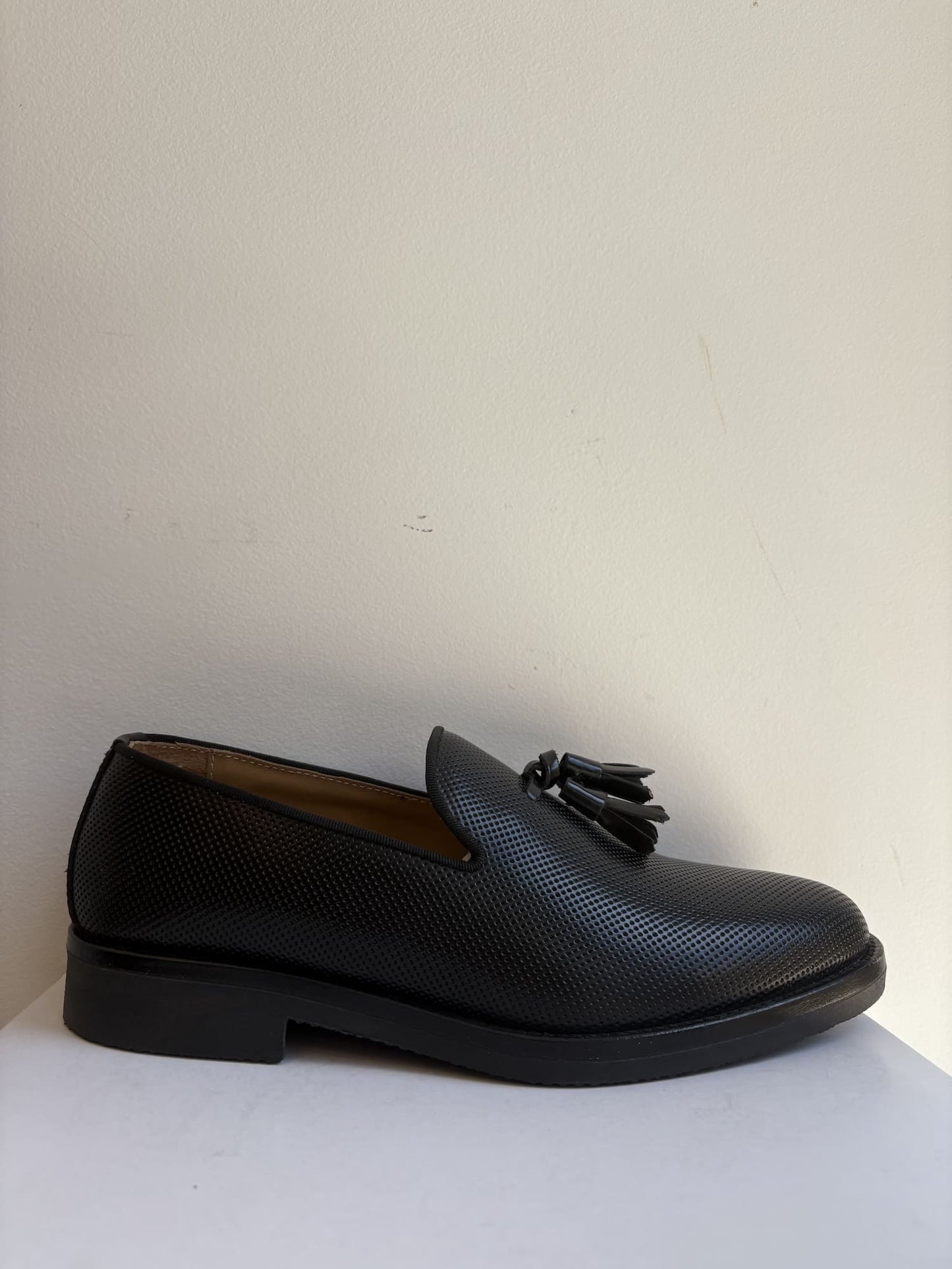 Mocassino forato con fondo gomma