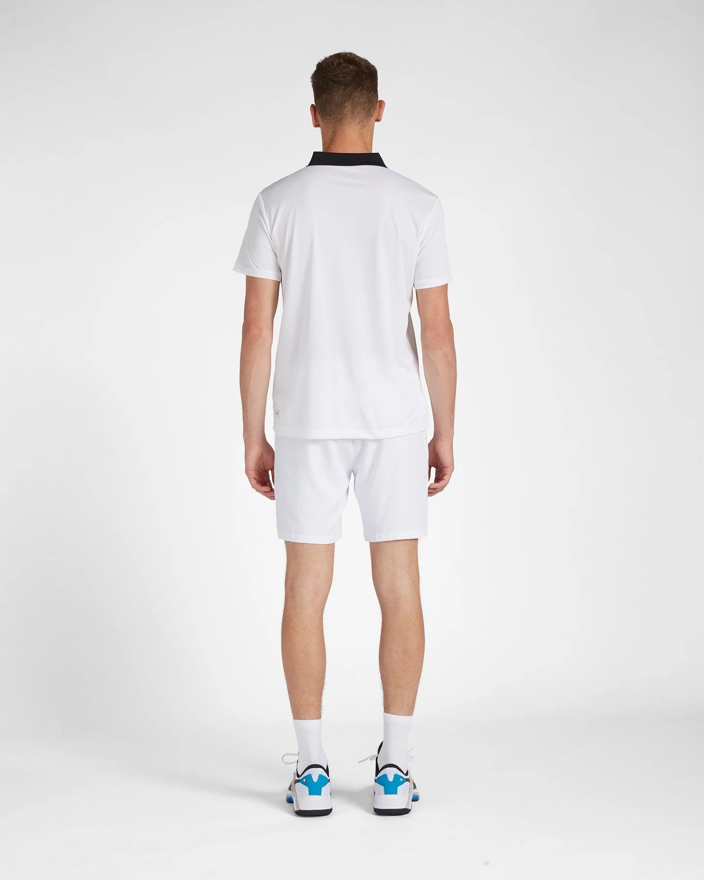 Polo tennis in tessuto leggero ed elasticizzato
