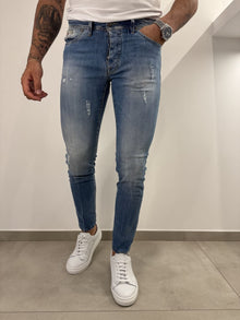 Jeans slim uomo strappato