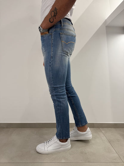 Jeans slim uomo strappato