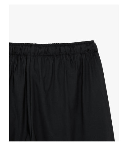 Pantaloni con laccio wide leg con stiro in piega