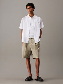 Bermuda in twill con pieghe