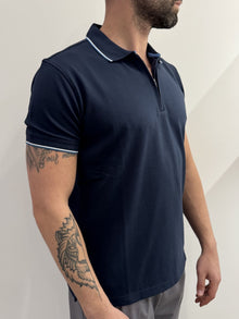 Polo in piquet con mezza zip