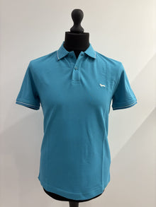 Polo Harmont&Blain con righe su collo e bordo maniche