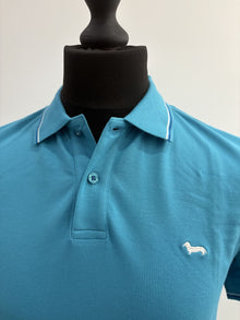Polo Harmont&Blain con righe su collo e bordo maniche