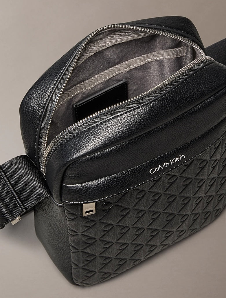 Borsa reporter con monogramma stampato all over