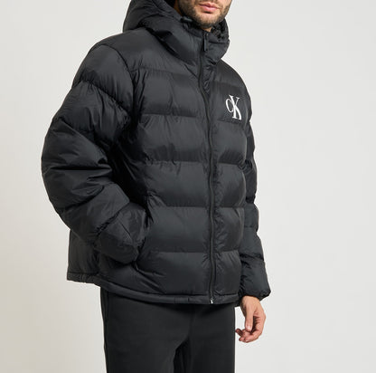 Piumino con monogramma Calvin Klein