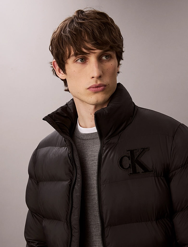 Piumino con monogramma
