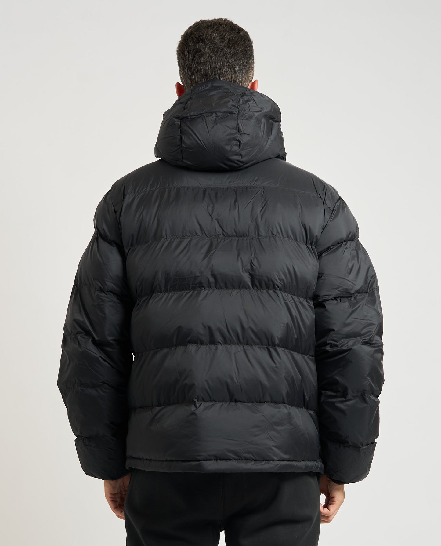 Piumino con monogramma Calvin Klein