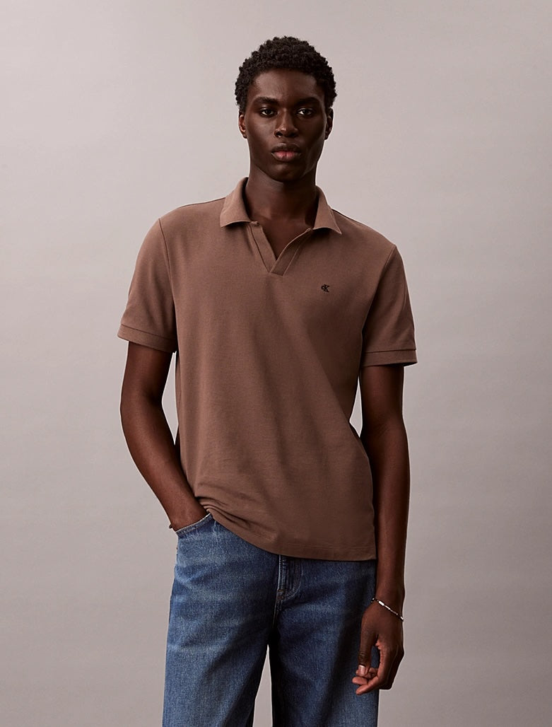 Polo in piqué di cotone con colletto aperto Calvin Klein