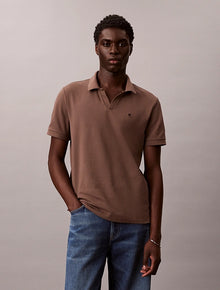 Polo in piqué di cotone con colletto aperto Calvin Klein
