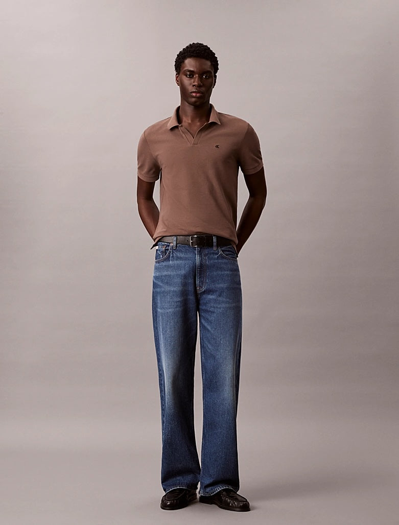 Polo in piqué di cotone con colletto aperto Calvin Klein