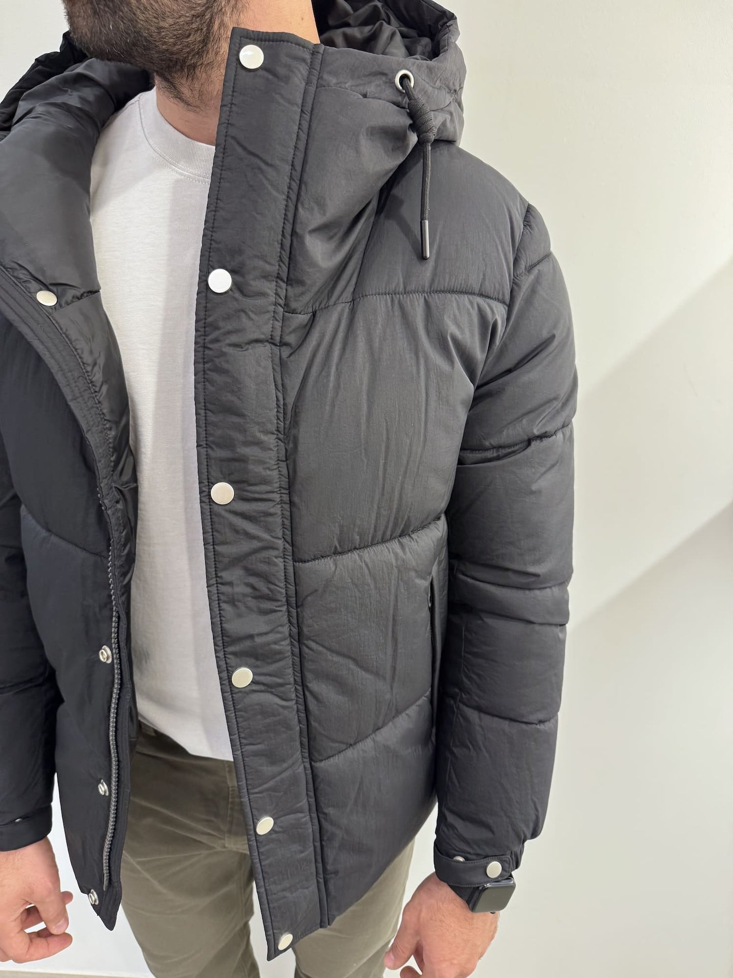 Giubbotto trapunta larga con bottoni e cerniera