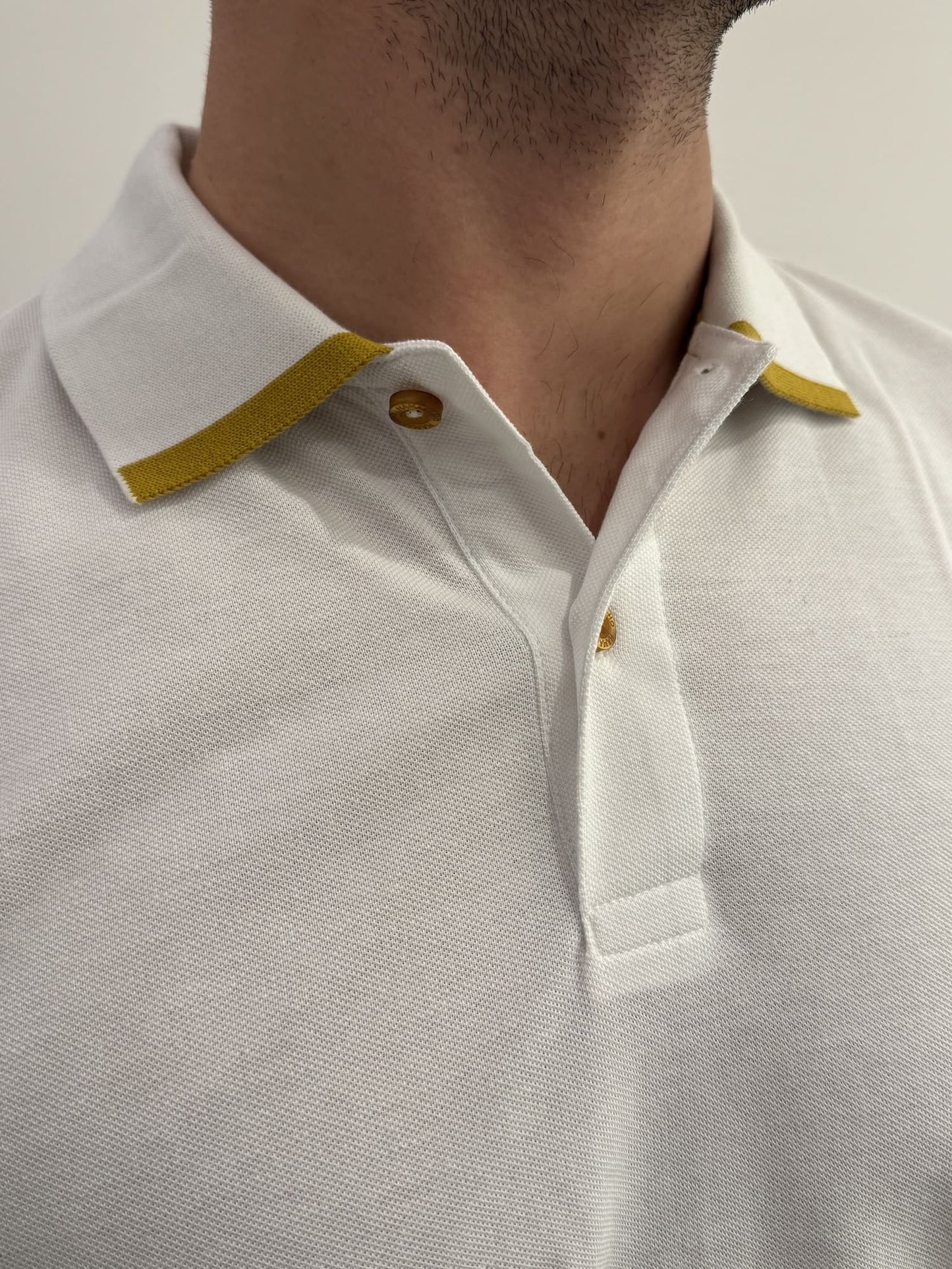 Polo in cotone con bordino