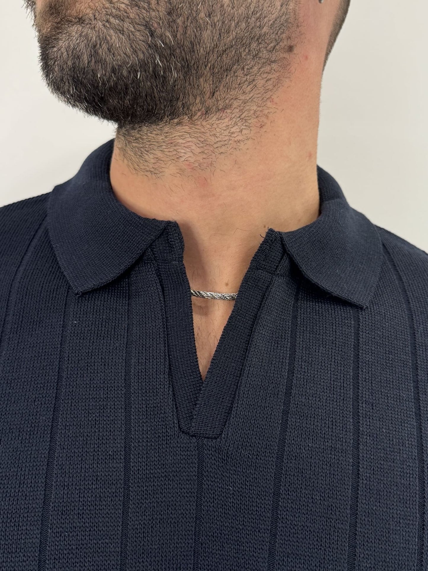 Polo manica lunga a coste blu