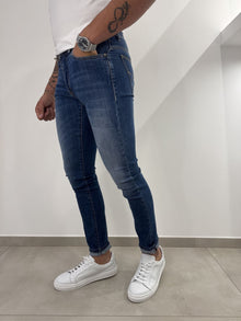 Jeans slim uomo slavato