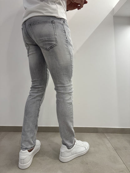 Jeans skinny grigio slavato