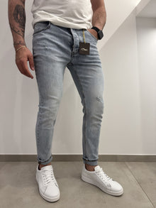 Jeans skinny chiaro graffiato