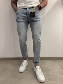 Jeans skinny chiaro graffiato