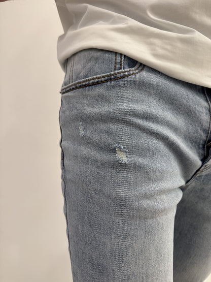 Jeans skinny chiaro graffiato